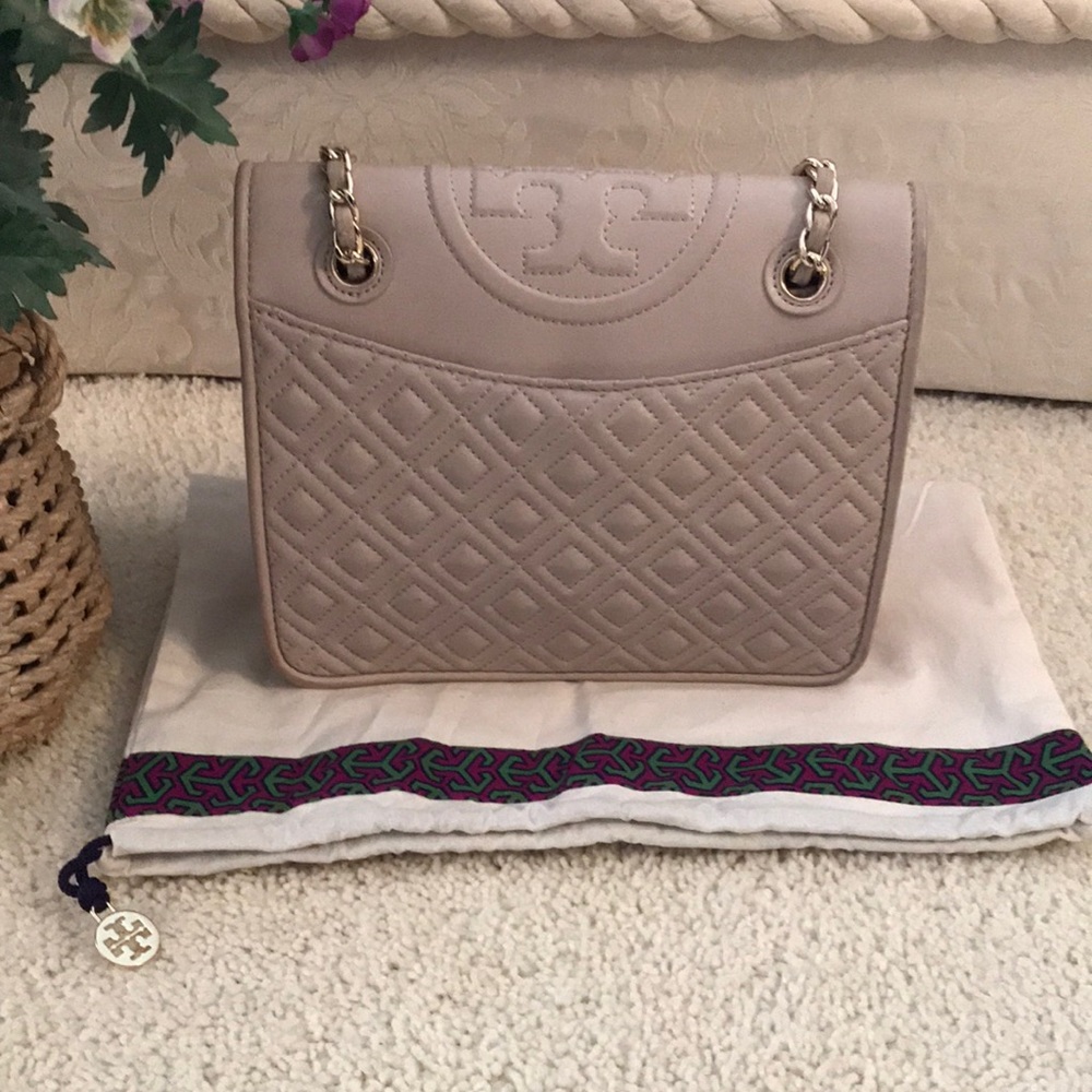 Tory Burch Savannah quilted leather convertible purse in a nude/pink color .